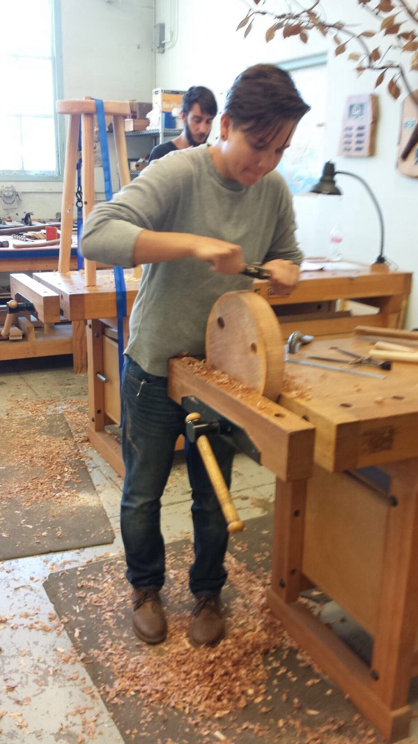 Smoothing out the edge of the seat with a spokeshave