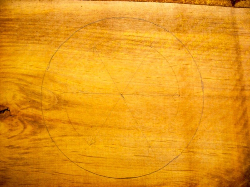 12" diameter seat. 10" diameter inner circle marks the placement of the three holes for legs. Note: the radius of the inner circle = the distance between each of the six points along the circumference.